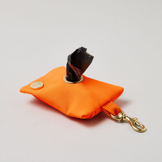 isartau Kotbeutelspender Softie Neonorange, goldene Beschläge