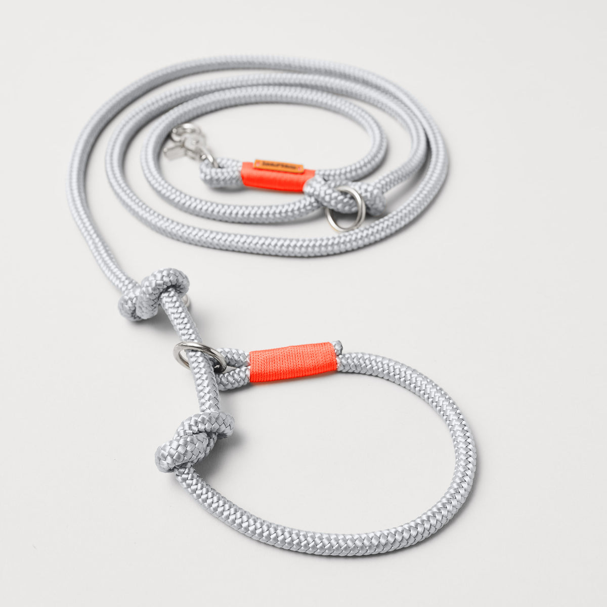 Retrieverleine aus Tau Pebble Stone Neonorange, Halsung mit integrierter Leine, silberne Karabiner, 2-fach längenverstellbar, erhältlich in 8mm